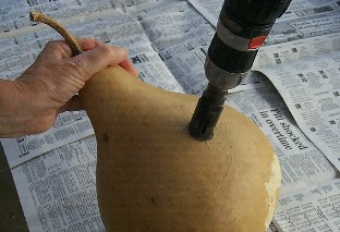 drilling a dried kettle gourd
