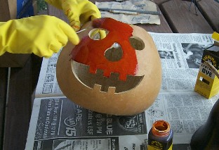crafting a gourd jack-o'-lantern